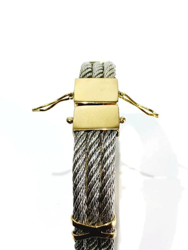 Bracelet Bracelet en or jaune 18 carats et argent à câbles tressés 58 Facettes