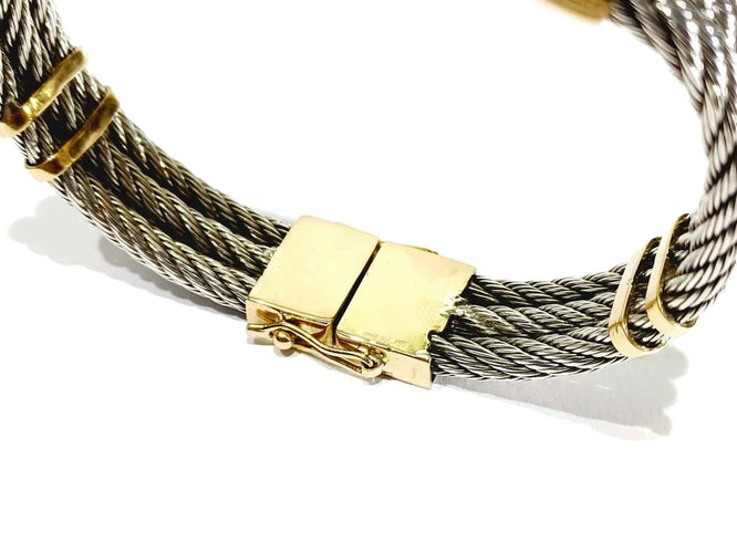 Bracelet Bracelet en or jaune 18 carats et argent à câbles tressés 58 Facettes