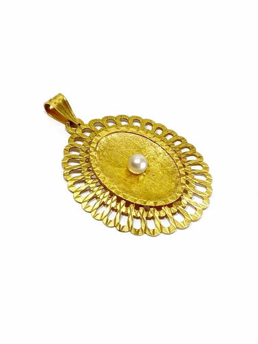 Pendentif Pendentif en or jaune 18 carats et perle 58 Facettes