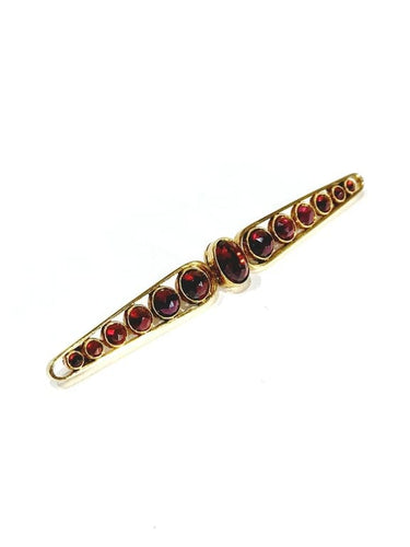 Broche Broche Art déco en or jaune 18 carats et grenats 58 Facettes