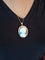 Pendentif Pendentif broche camée sur agate en or rose 18 carats 58 Facettes