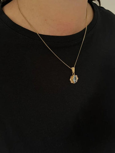 Pendentif Pendentif en or champagne 18 carats et topaze bleue 58 Facettes