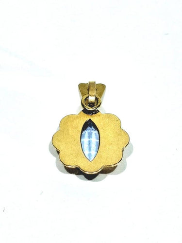 Pendentif Pendentif en or champagne 18 carats et topaze bleue 58 Facettes