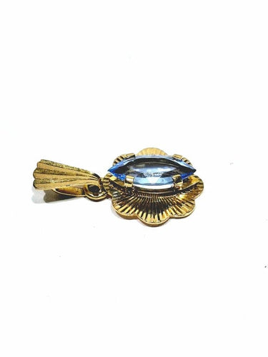 Pendentif Pendentif en or champagne 18 carats et topaze bleue 58 Facettes