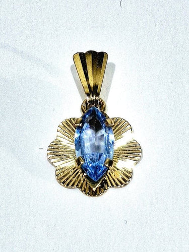 Pendentif Pendentif en or champagne 18 carats et topaze bleue 58 Facettes