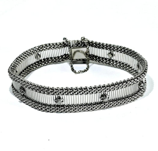 Bracelet Bracelet en or blanc ajouré avec diamants taille brillant 58 Facettes