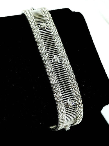 Bracelet Bracelet en or blanc ajouré avec diamants taille brillant 58 Facettes