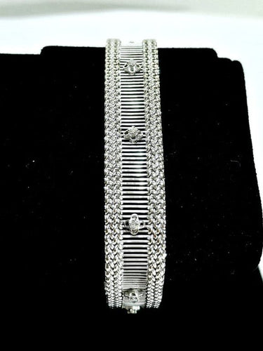 Bracelet Bracelet en or blanc ajouré avec diamants taille brillant 58 Facettes