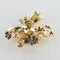 Broche Broche bouquet rétro en or jaune 18 carats et pierres 58 Facettes 18-264