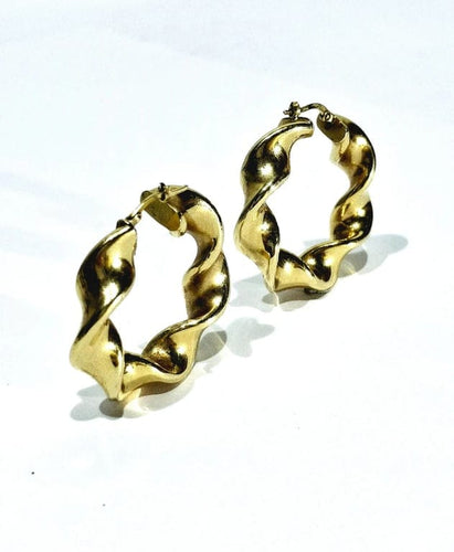 Boucles d'oreilles Créoles torsadées en or jaune 18 carats 58 Facettes