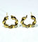 Boucles d'oreilles Créoles torsadées en or jaune 18 carats 58 Facettes