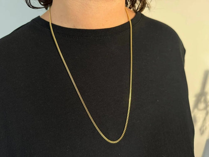Collier Chaîne gourmette en or jaune 18 carats 58 Facettes