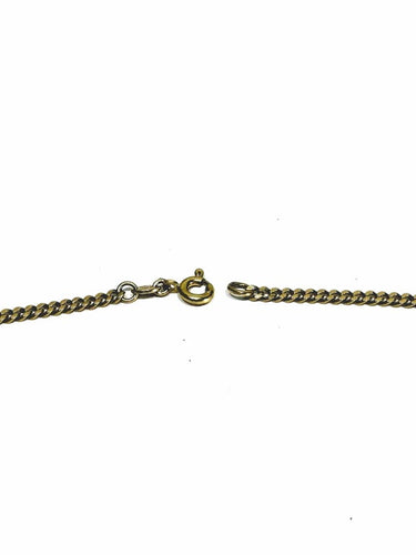 Collier Chaîne gourmette en or jaune 18 carats 58 Facettes