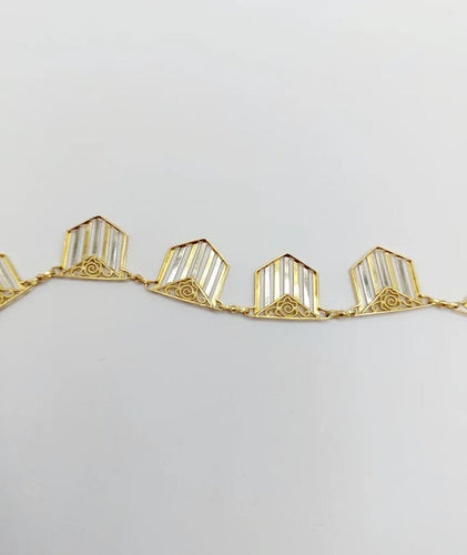 Collier Collier Art déco à motifs filigranés en or jaune et blanc 18k 58 Facettes A04100