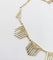Collier Collier Art déco à motifs filigranés en or jaune et blanc 18k 58 Facettes A04100