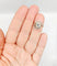 Bague 48 Bague tourbillon ancienne en or 18k et platine, diamants 58 Facettes A06630