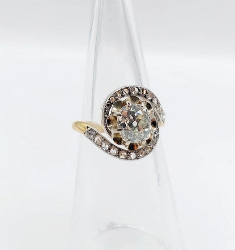 Bague 48 Bague tourbillon ancienne en or 18k et platine, diamants 58 Facettes A06630