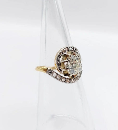 Bague 48 Bague tourbillon ancienne en or 18k et platine, diamants 58 Facettes A06630