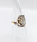 Bague 48 Bague tourbillon ancienne en or 18k et platine, diamants 58 Facettes A06630