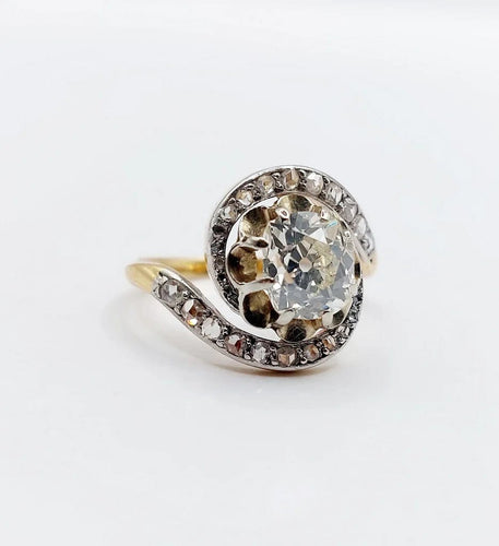 Bague 48 Bague tourbillon ancienne en or 18k et platine, diamants 58 Facettes A06630