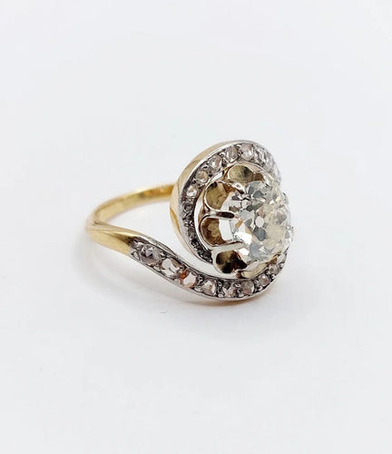 Bague 48 Bague tourbillon ancienne en or 18k et platine, diamants 58 Facettes A06630