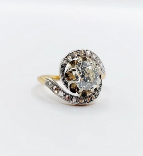 Bague 48 Bague tourbillon ancienne en or 18k et platine, diamants 58 Facettes A06630