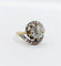 Bague 48 Bague tourbillon ancienne en or 18k et platine, diamants 58 Facettes A06630