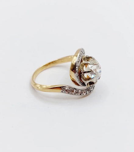 Bague 48 Bague tourbillon ancienne en or 18k et platine, diamants 58 Facettes A06630
