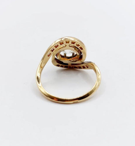Bague 48 Bague tourbillon ancienne en or 18k et platine, diamants 58 Facettes A06630