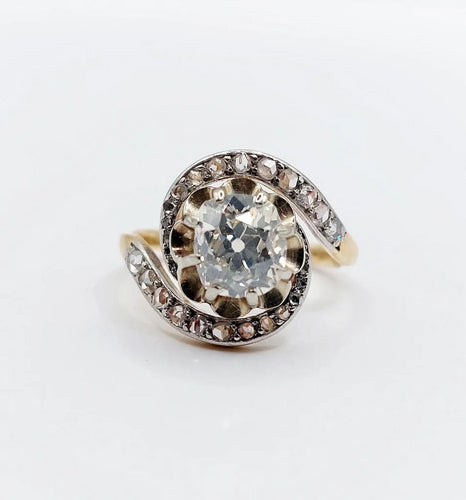 Bague 48 Bague tourbillon ancienne en or 18k et platine, diamants 58 Facettes A06630