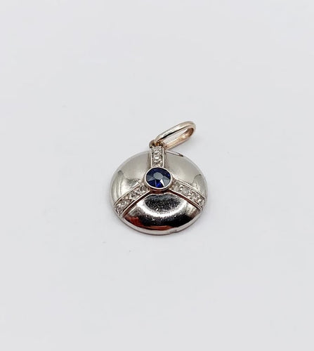 Pendentif Pendentif cible Art déco en or blanc 18k et platine, saphir synthétique et diamants 58 Facettes A06550