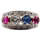 Bague 51 Bague jarretière Art déco en or blanc 18k, diamants, saphir et rubis 58 Facettes A03240