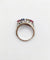 Bague 51 Bague jarretière Art déco en or blanc 18k, diamants, saphir et rubis 58 Facettes A03240