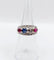 Bague 51 Bague jarretière Art déco en or blanc 18k, diamants, saphir et rubis 58 Facettes A03240