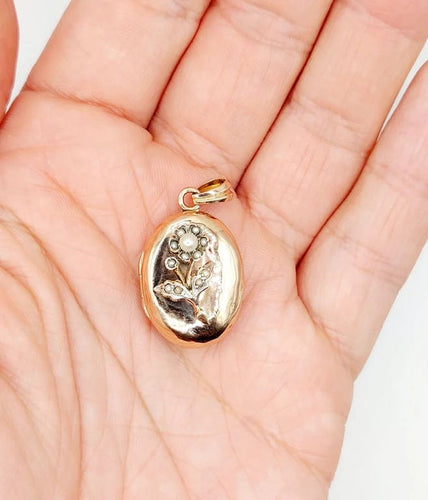 Pendentif Pendentif porte-photo en or rose 18k et argent, perles (circa 1900) 58 Facettes A05863