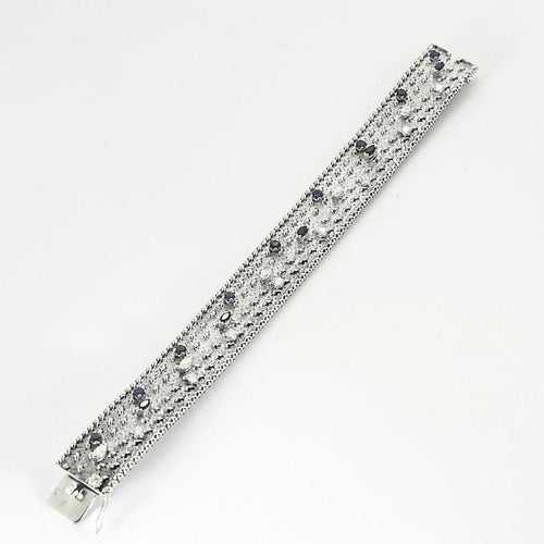 Bracelet Prestige Royal - Bracelet rigide en or blanc avec diamants et saphirs 58 Facettes LP1413/