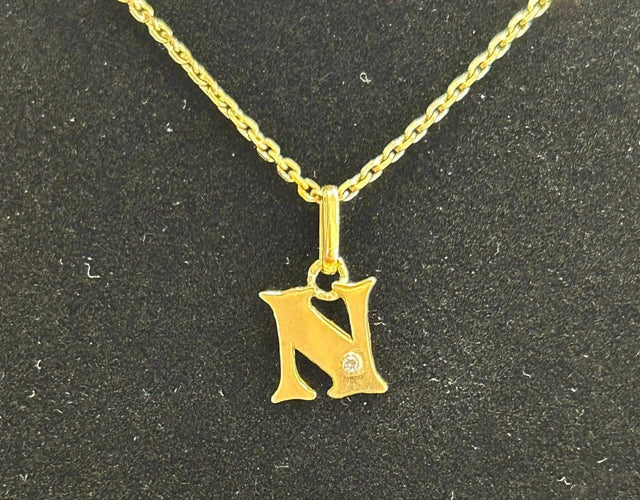 Pendentif Pendentif lettre N en or jaune 18k et diamant 58 Facettes LP251/16