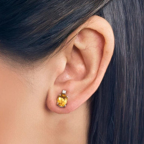 Boucles d'oreilles Boucles d'oreilles en or blanc avec saphirs jaunes et diamants 58 Facettes LP993/16