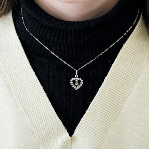 Collier Collier pendentif cœur en or blanc 750 et diamants 58 Facettes LP963/16
