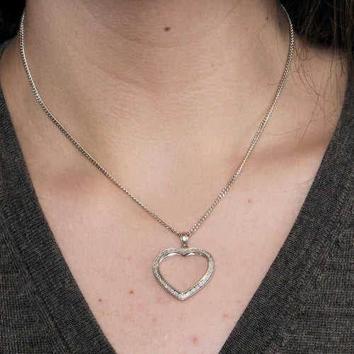 Pendentif Pendentif cœur en or blanc 18 carats et diamants 58 Facettes LP1115/16
