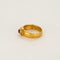 Bague 58 Ωζα - Bague jonc martelé en or jaune brun 750 sertie d’une spinelle rose 58 Facettes LP1182