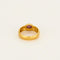 Bague 58 Ωζα - Bague jonc martelé en or jaune brun 750 sertie d’une spinelle rose 58 Facettes LP1182