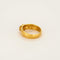 Bague 58 Ωζα - Bague jonc martelé en or jaune brun 750 sertie d’une spinelle rose 58 Facettes LP1182