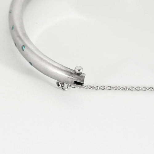 Bracelet Bracelet jonc en or blanc saphirs Teal et saphirs blancs 58 Facettes LP1222/14