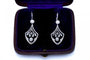 Boucles d'oreilles Boucles d'oreilles Art nouveau pendantes en or blanc 14 carats et diamants 58 Facettes 9850