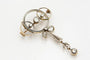 Broche Broche Art déco en or jaune, platine et diamants 58 Facettes 9456