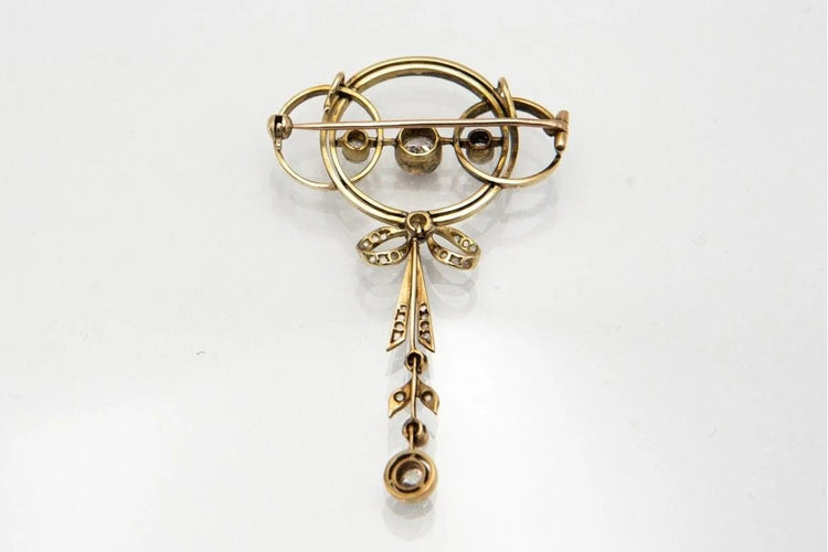 Broche Broche Art déco en or jaune, platine et diamants 58 Facettes 9456