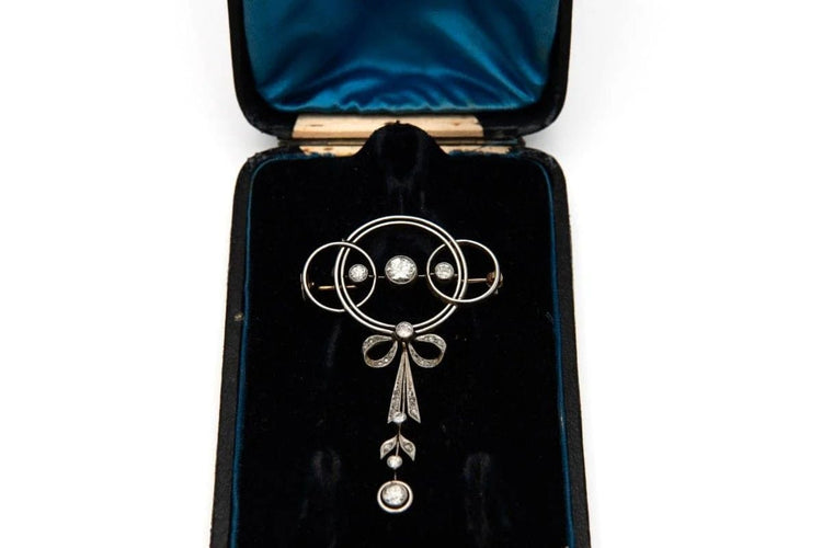 Broche Broche Art déco en or jaune, platine et diamants 58 Facettes 9456