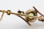 Broche Broche ancienne en or jaune avec olivine et diamants 58 Facettes 10280