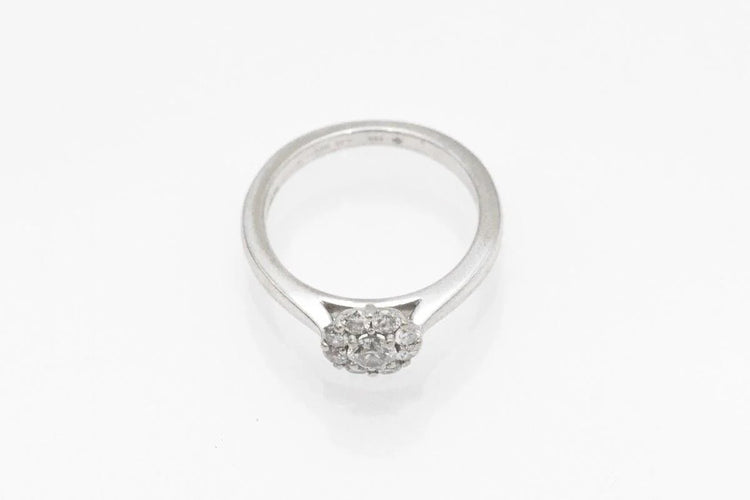 Bague Bague fleur en or blanc 18 carats et diamants 58 Facettes 10322